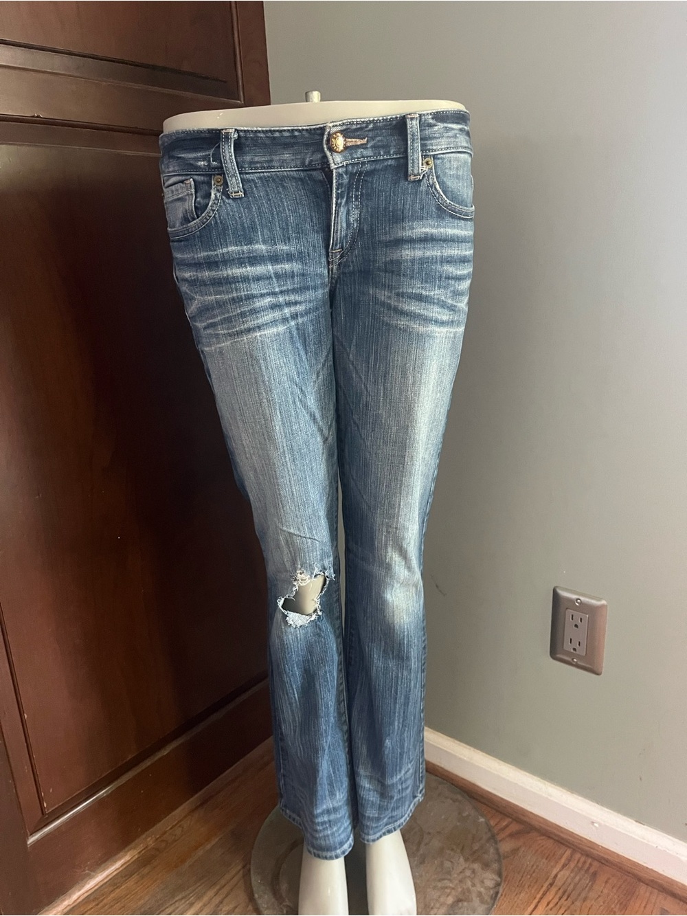 Express Women's Light Blue Boot-Cut Jeans with Knee Distress